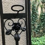Wrought iron coat holder with 1930