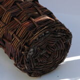 Ancient bottle in wicker