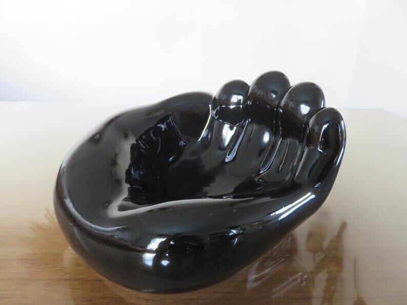 "hand" in black ceramic trinket bowl 60/70