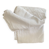 Old white cotton tablecloth.