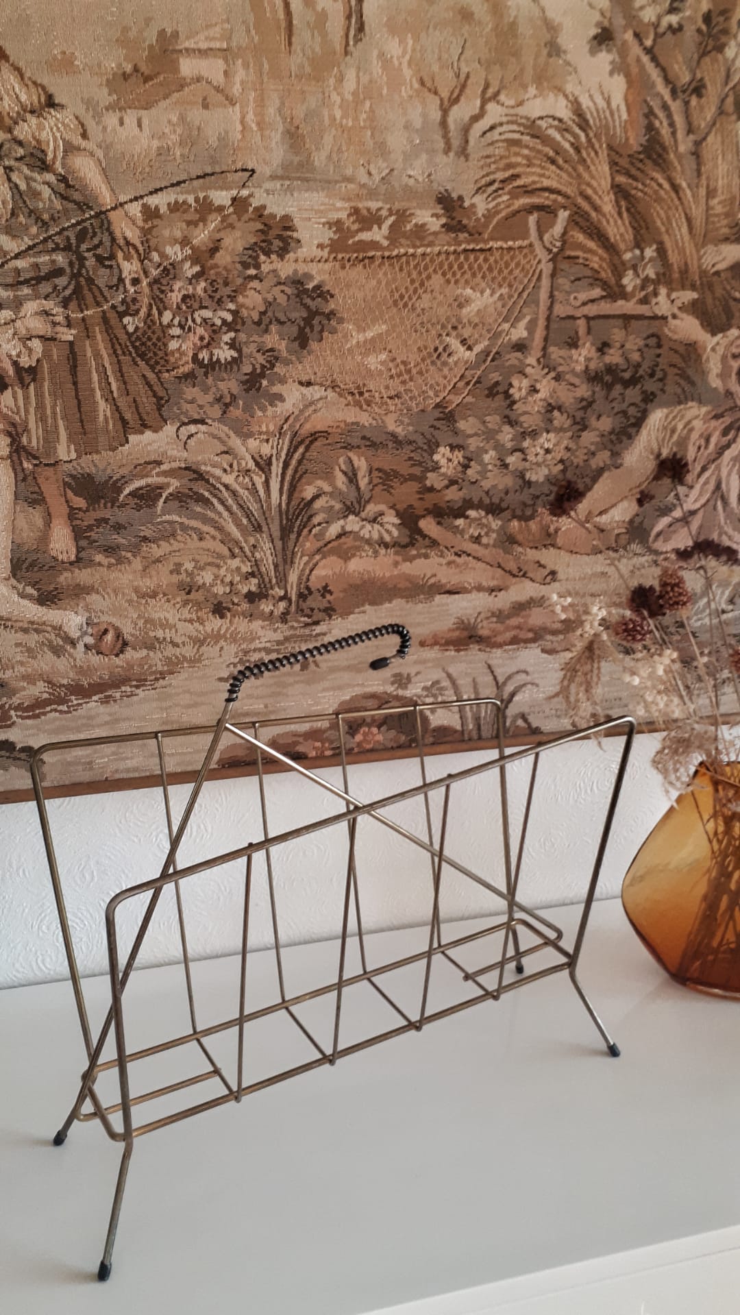 Gold metal newspaper holder