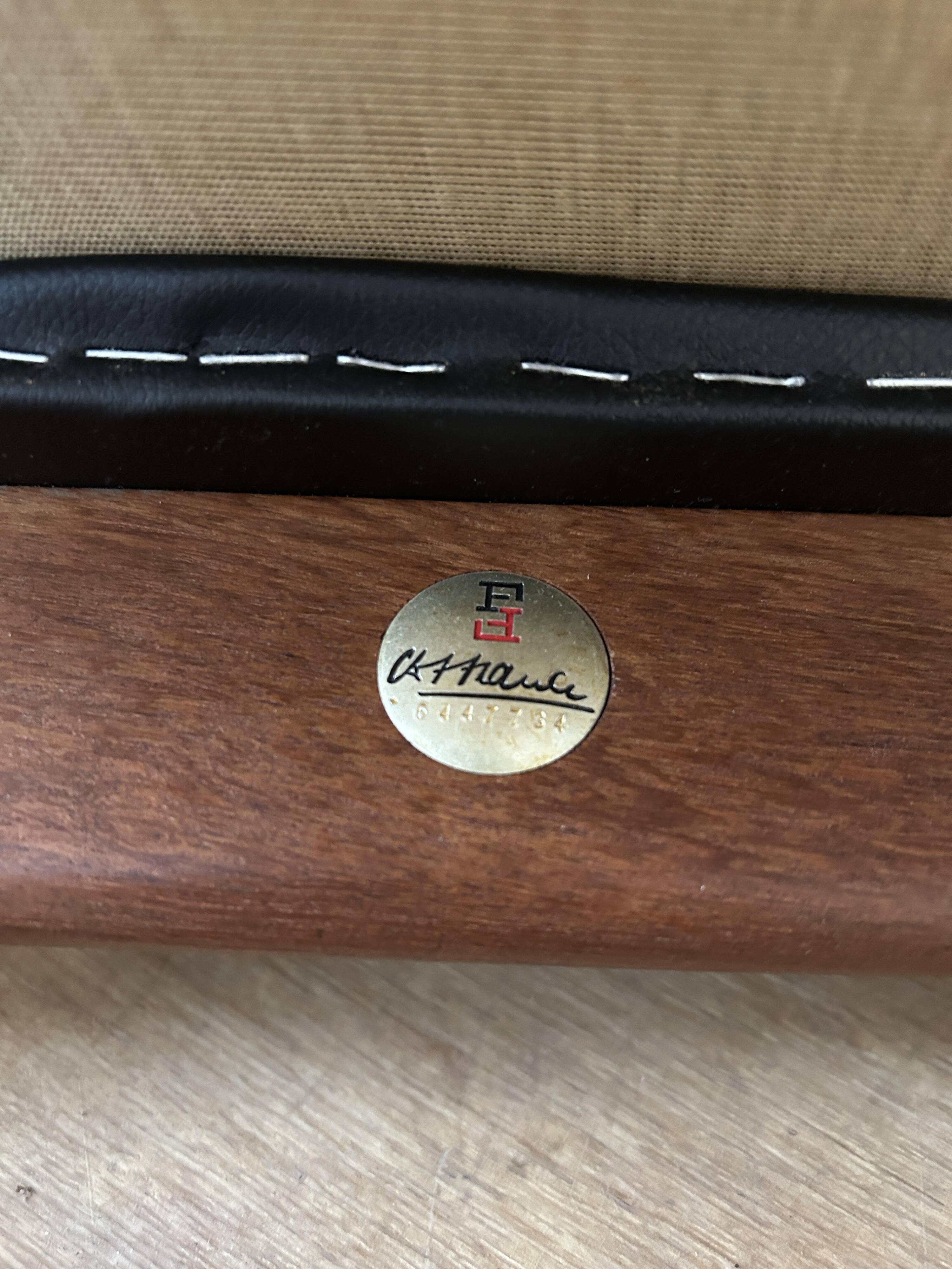 Finished Juhl armchair and its ottoman.