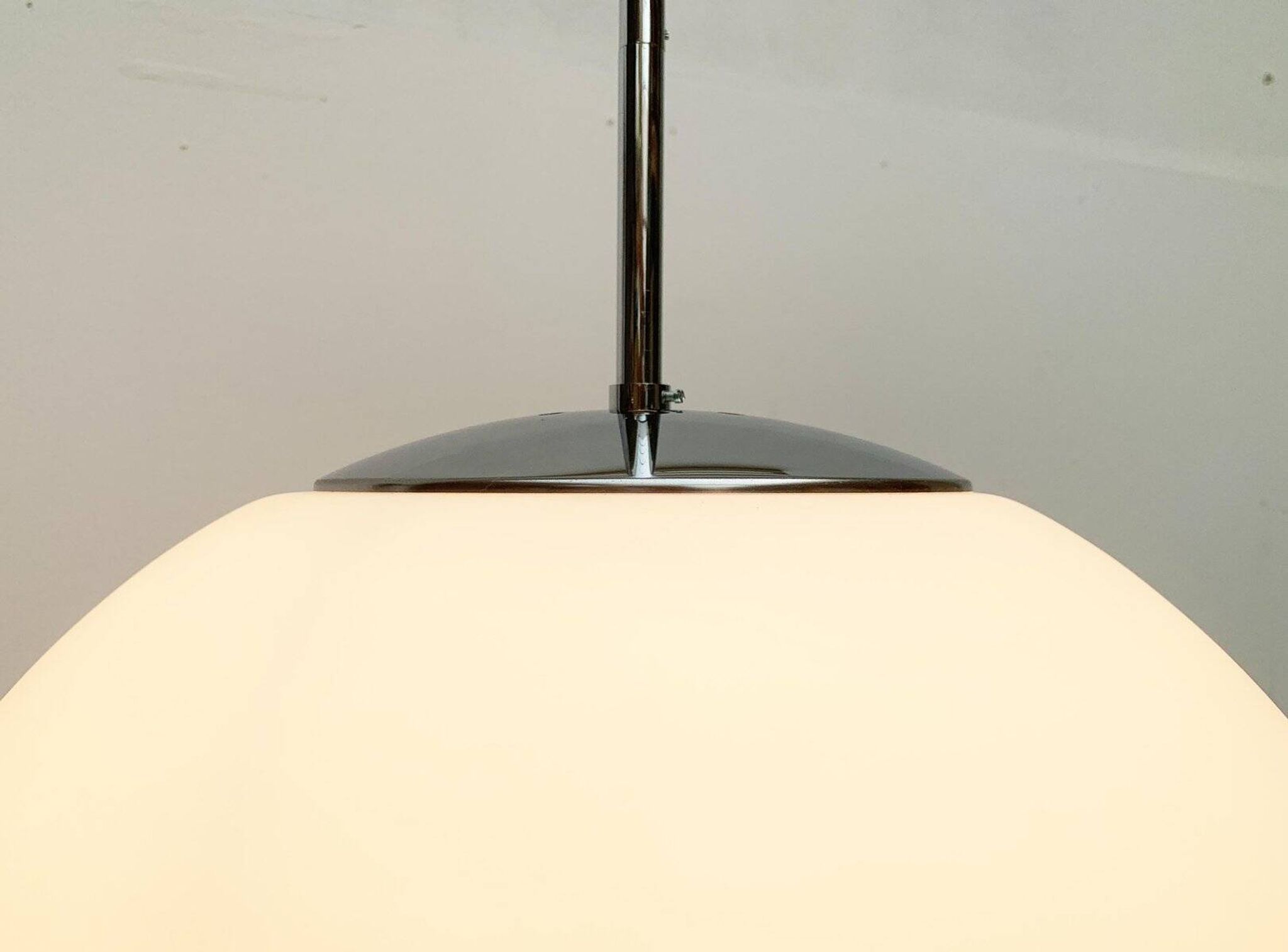 Vintage German space age glass ball pendant lamp by Limburg.