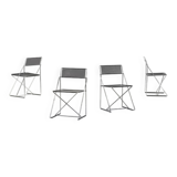Quatre chaises empilables Nuova X-Line de Niels Jorgen Haugesen  pour Magis