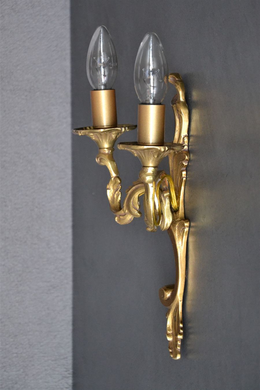 Wall lamp in twisted golden bronze baroque 2 lights