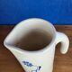 Modernist ceramic pitcher, signed polychrome decoration