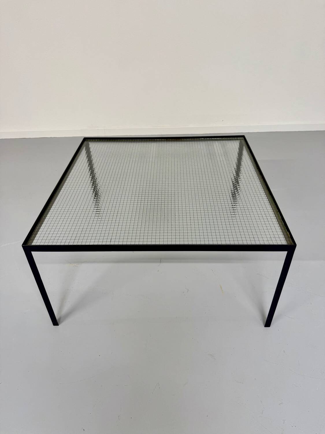 Old coffee table in metal and checkered glass from the 50s