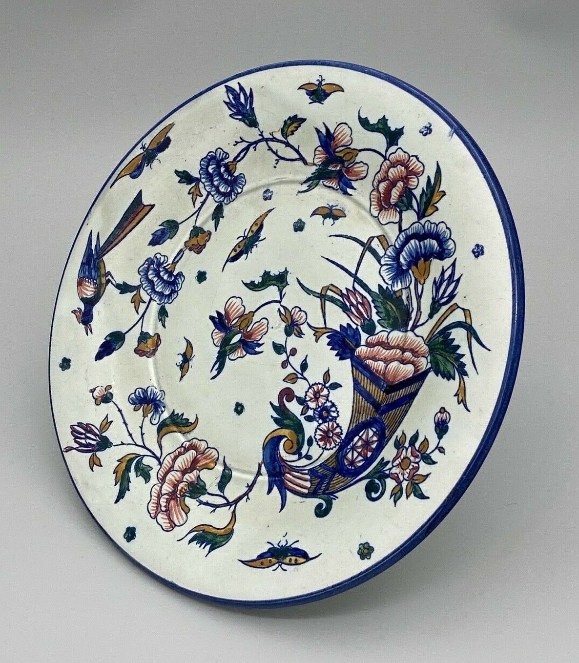 Plate gien with cornucopia decoration insect peacock butterfly