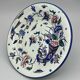 Plate gien with cornucopia decoration insect peacock butterfly