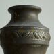 Pair of Art Deco vases in patinated metal