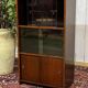 Small English oak library from the 1960s with sliding doors.