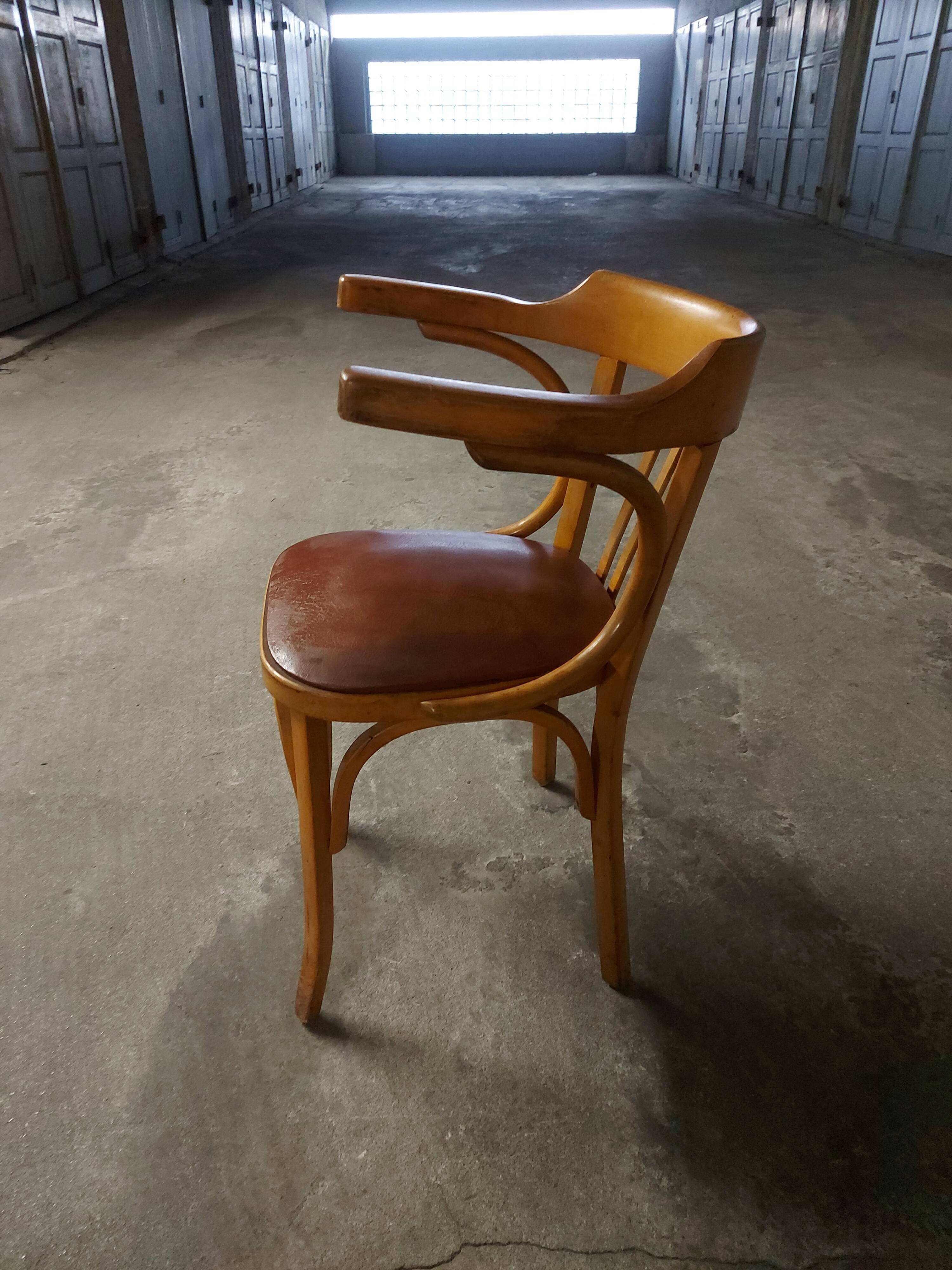 Fauteuil vintage en bois Baumann
