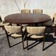 Table and 6 chairs set by Baumann
