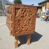Compact 4-drawer ethnic chest of drawers carved with scenes of African life