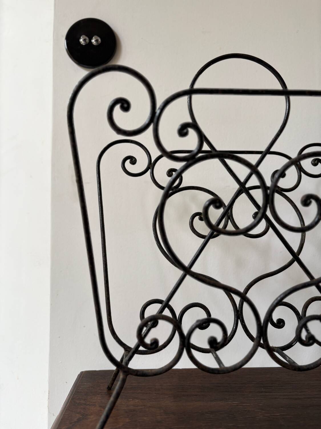 Vintage 50s cast iron magazine rack