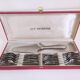Box of dessert forks and pie shovel Guy Degrenne