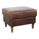 Sturdy vintage sheepskin ottoman in a beautiful large size with black piping