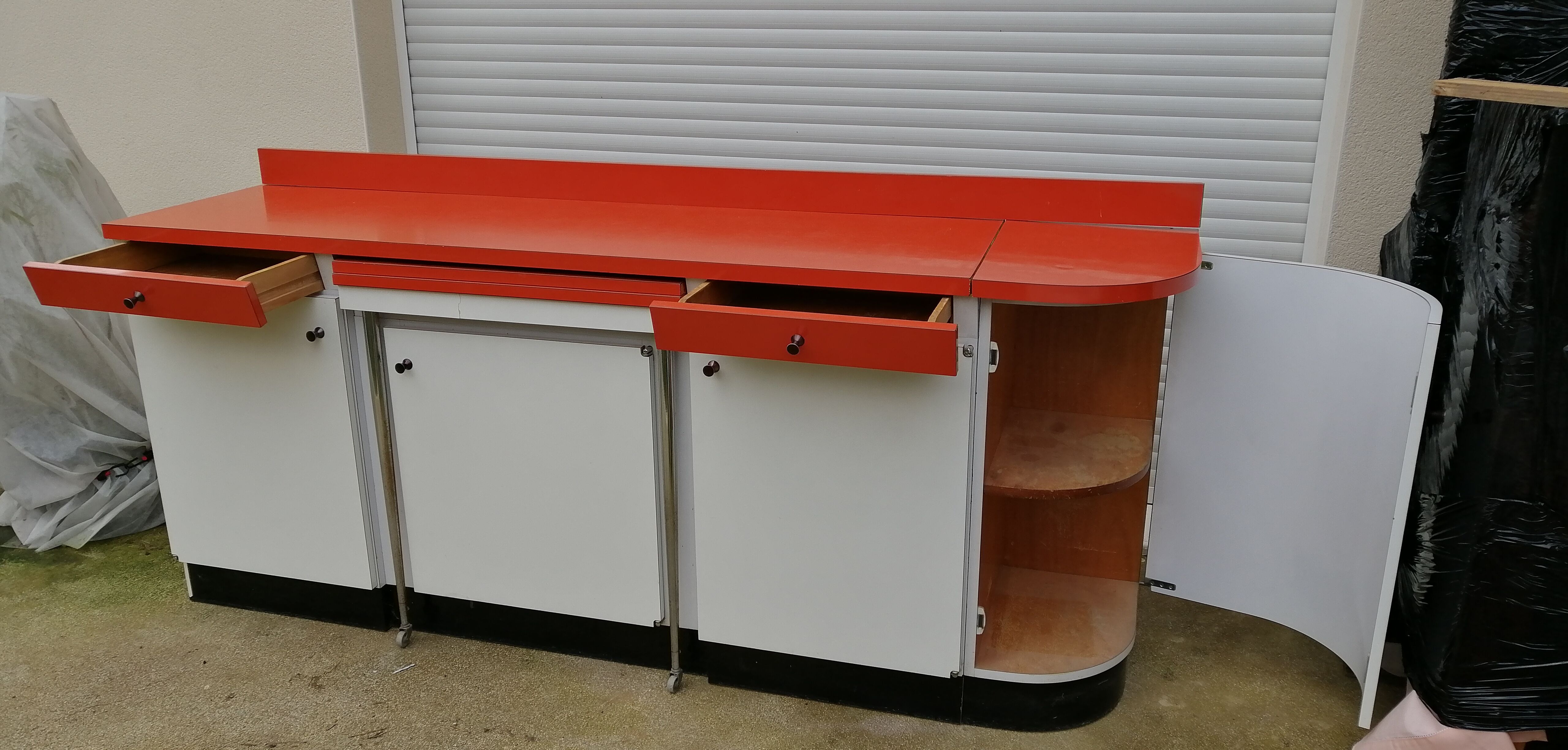 Formica sideboard with its 70' retractable table