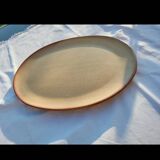 Oval dish in speckled enamelled stoneware