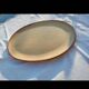Oval dish in speckled enamelled stoneware