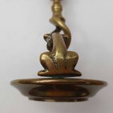 Antique bronze candlestick with dragon-shaped handle from the 17th century