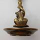Antique bronze candlestick with dragon-shaped handle from the 17th century