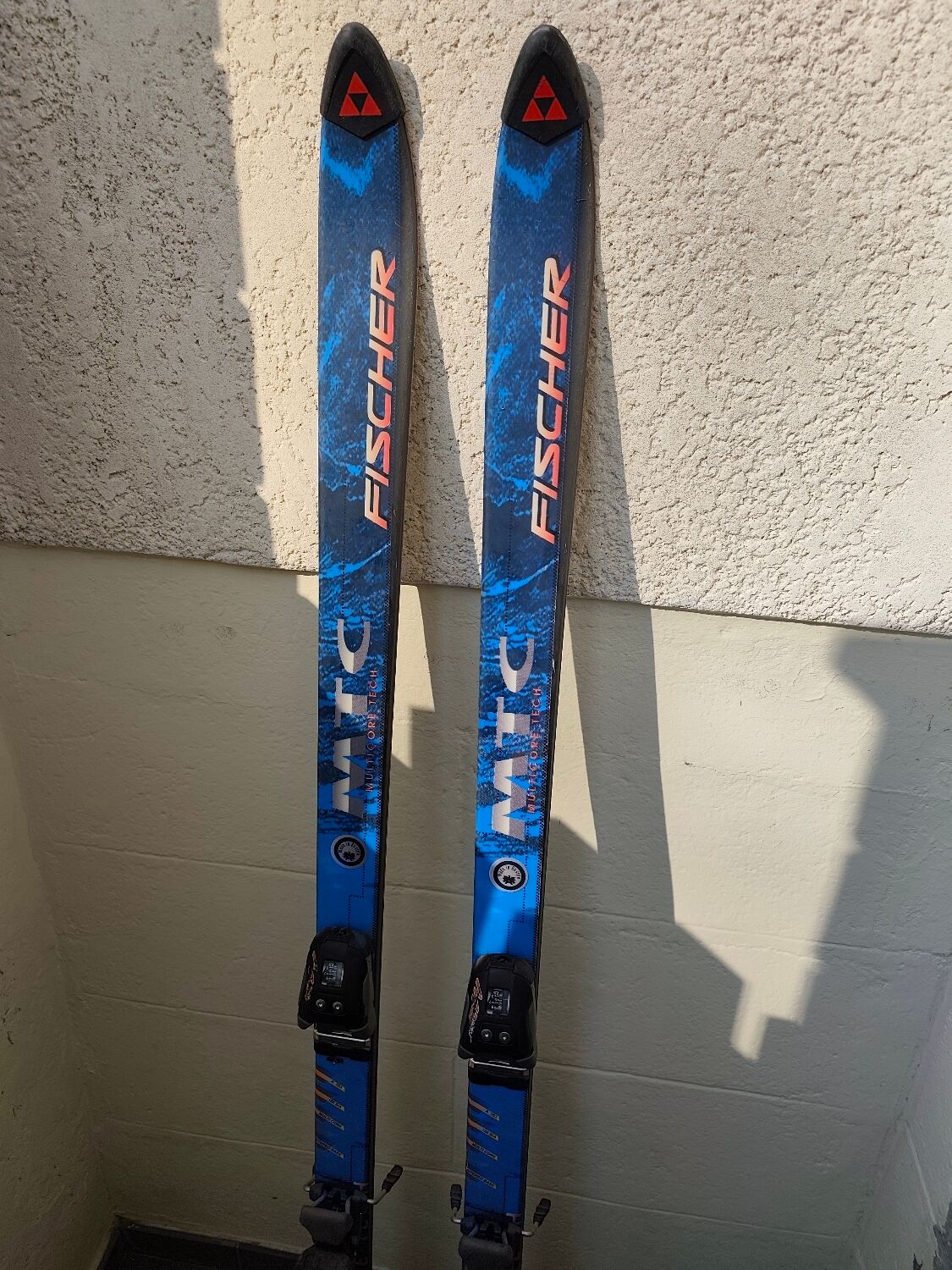 3 pairs of vintage skis: Rossignol Strato, ST 650 & Fischer.