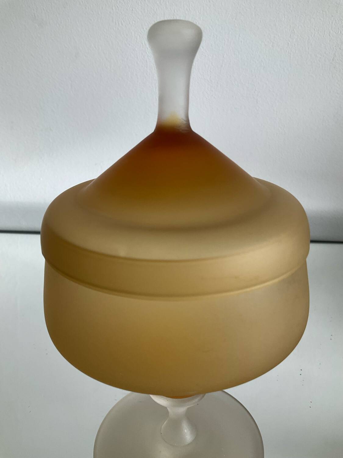 Vintage blown glass candy box on a stand