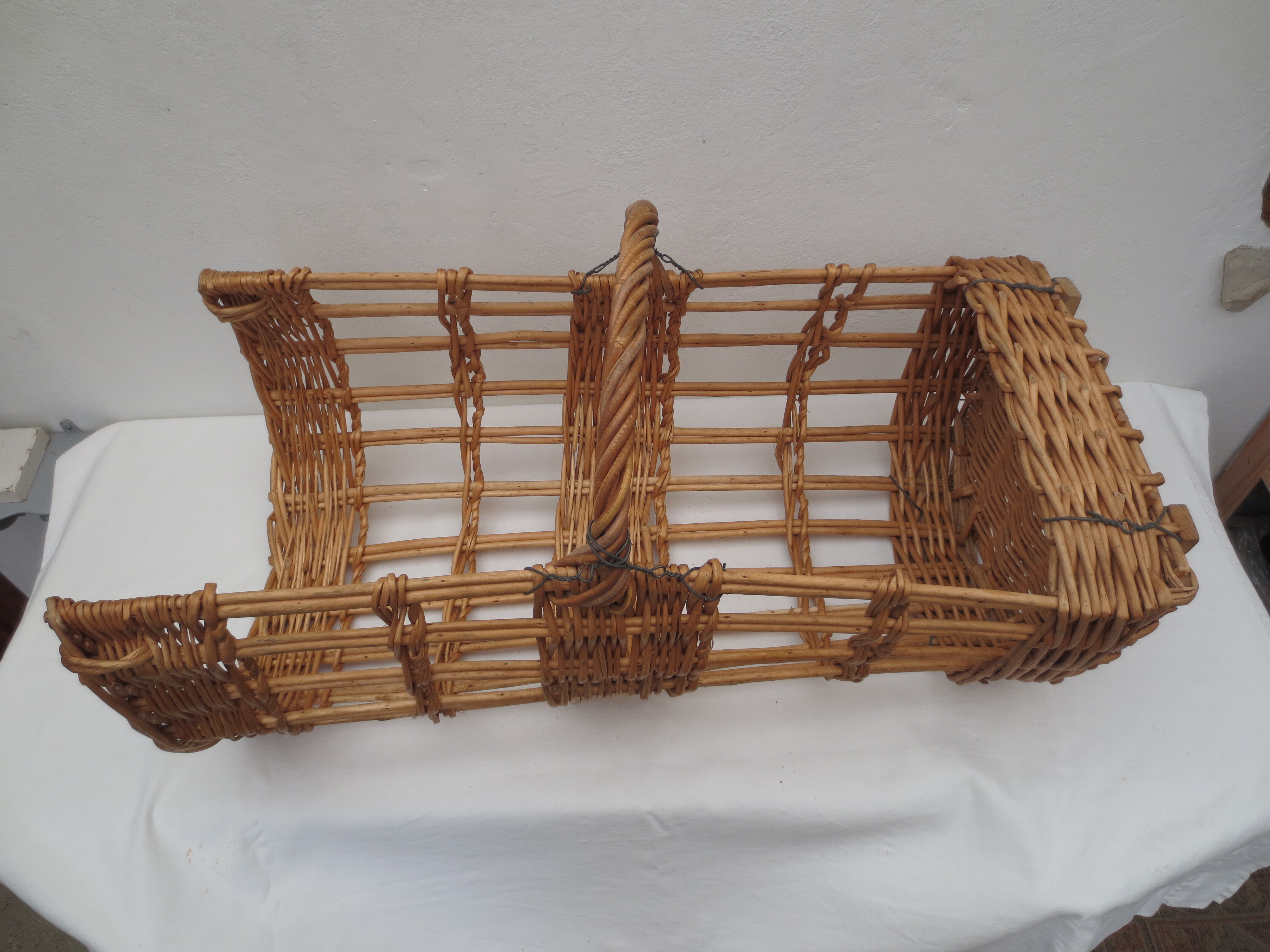 bread basket / handmade umbrella door in honey-coloured wicker