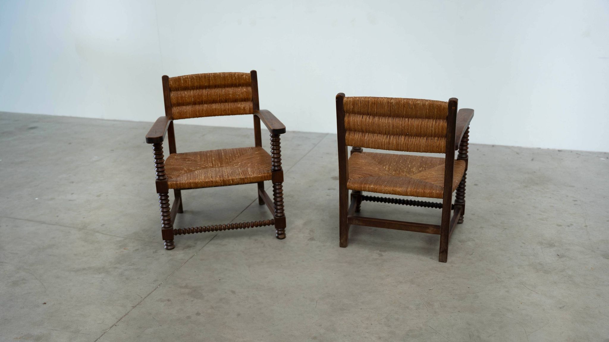 2 fauteuils dans le style de Charles Dudouyt