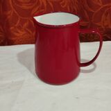 Pitcher in red enamelled sheet metal