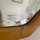 Vintage 1930s Art Deco bevelled octagonal mirror, wood and stucco - 66 x 45 cm
