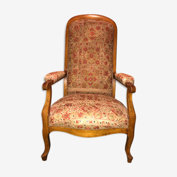 Fauteuil Voltaire début 19ème recouvert de tissu indien