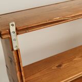 Vintage pine wall shelf with a scalloped front.