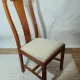 Set of 4 vintage chairs in stained wood and cream fabric.