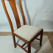 Set of 4 vintage chairs in stained wood and cream fabric.
