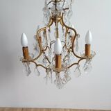 Bronze chandelier with tassels