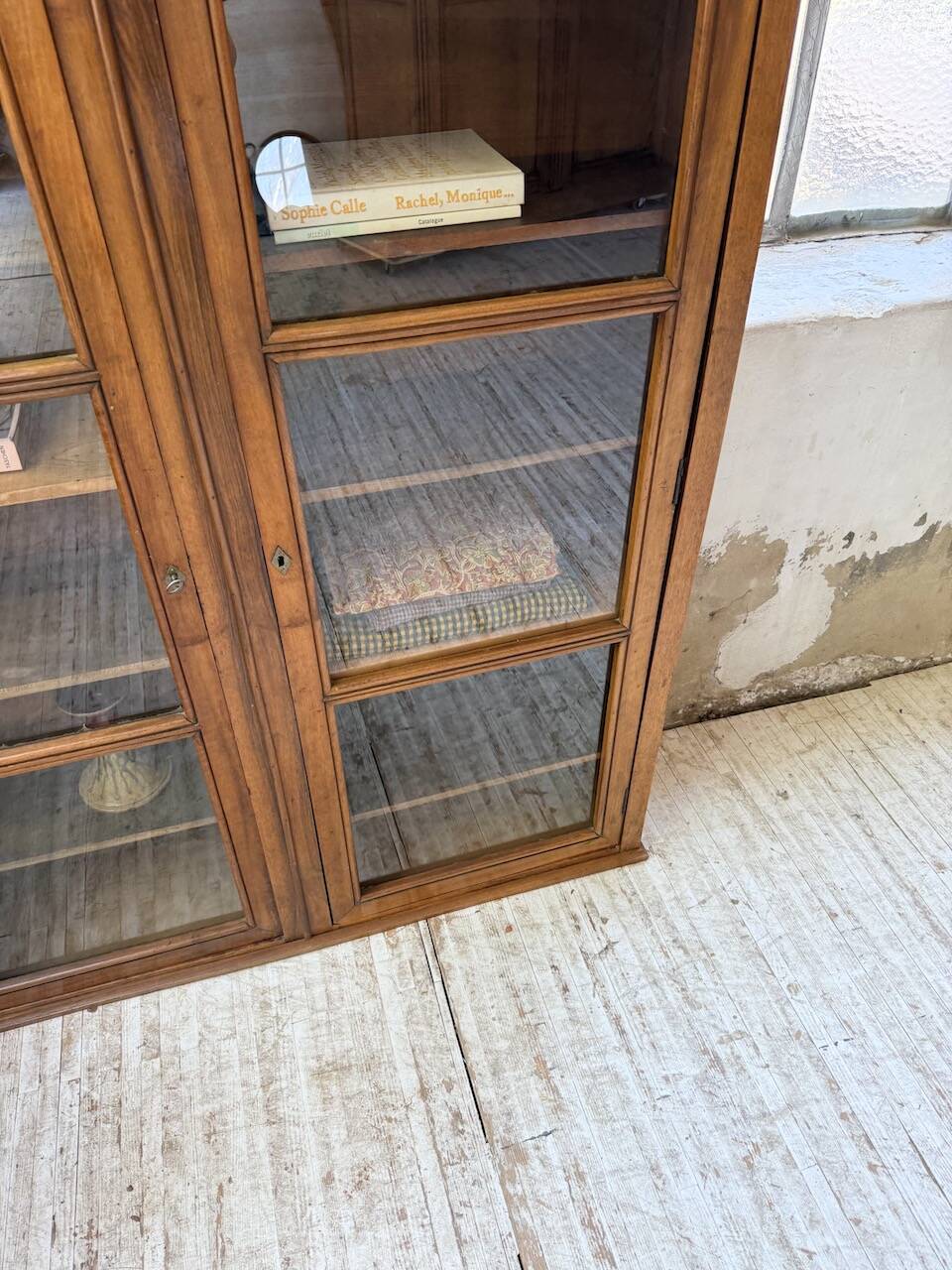 Glass-fronted walnut library 1900