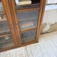 Glass-fronted walnut library 1900
