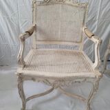 Pair of regency armchairs; canes; white lacquered 19th century
