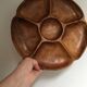 Round wooden dish with six compartments