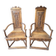 Pair of carved walnut armchairs in Renaissance style