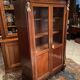 Mahogany and bronze showcase bookcase in Return from Egypt style