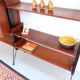 Vintage teak shelving system in 60s-70s style, retro style.