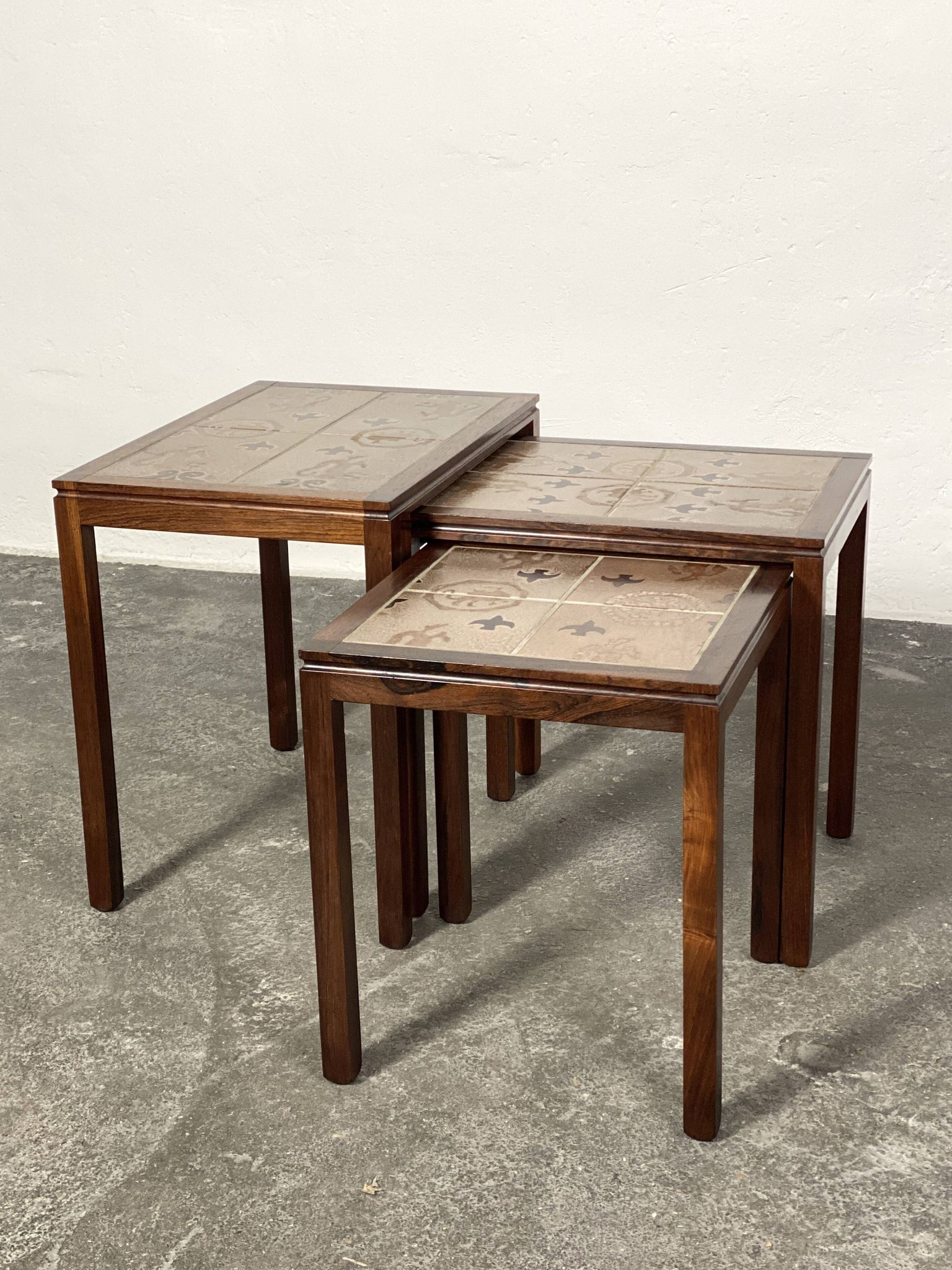 Danish nesting tables in rosewood and ceramic by Willy Ryomgard, Mo.