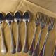 Series of 4 silver metal cutlery uniplat net model spoons forks