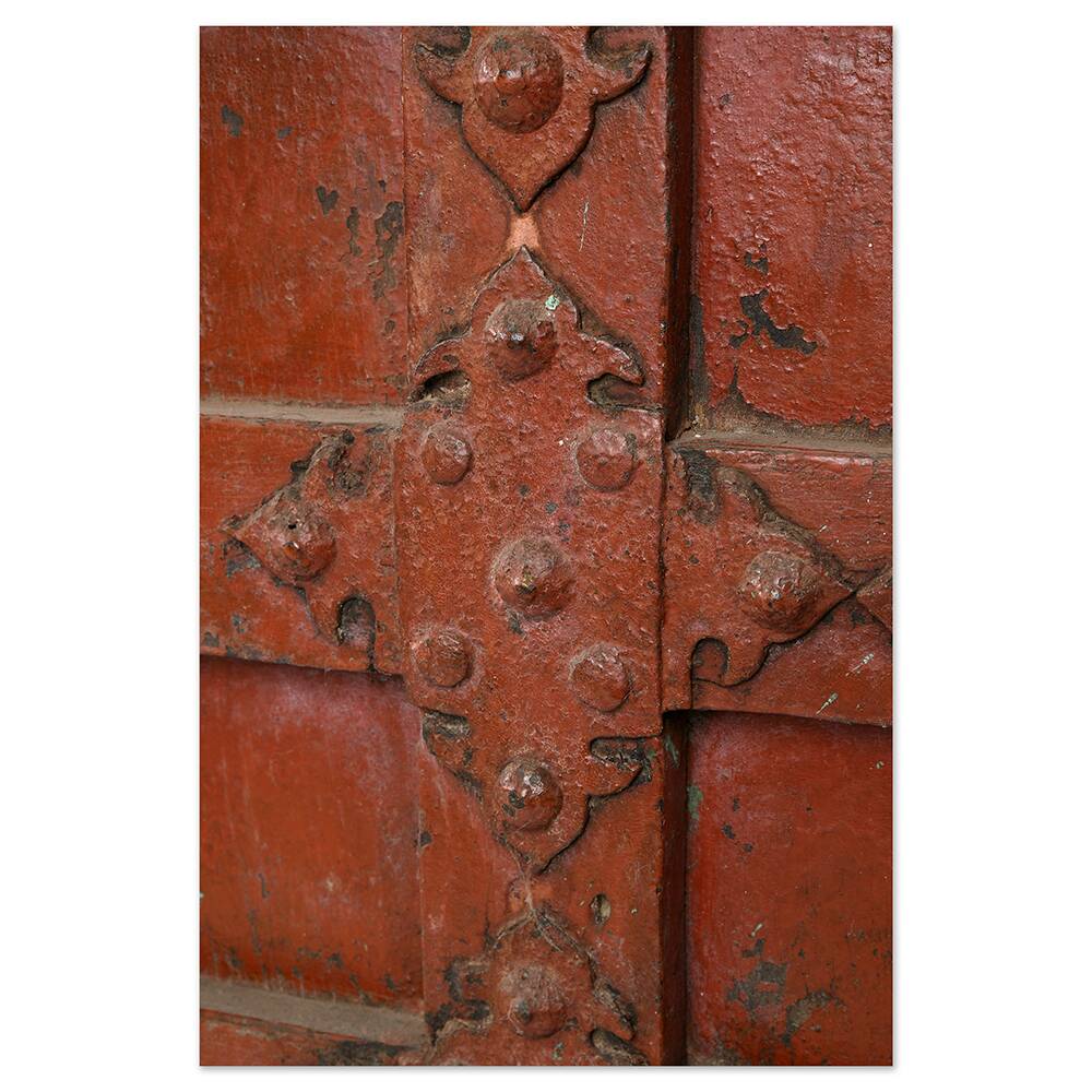 Large wooden and metal chest with red patina