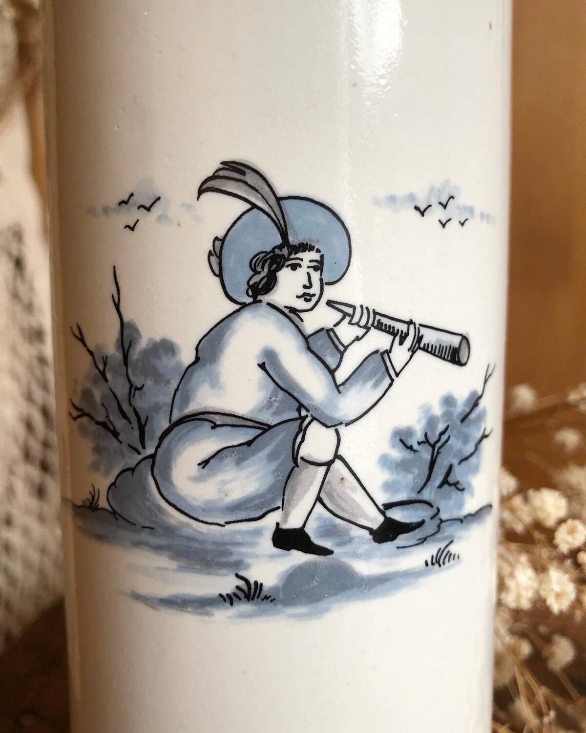 Bouteille en grès peinte