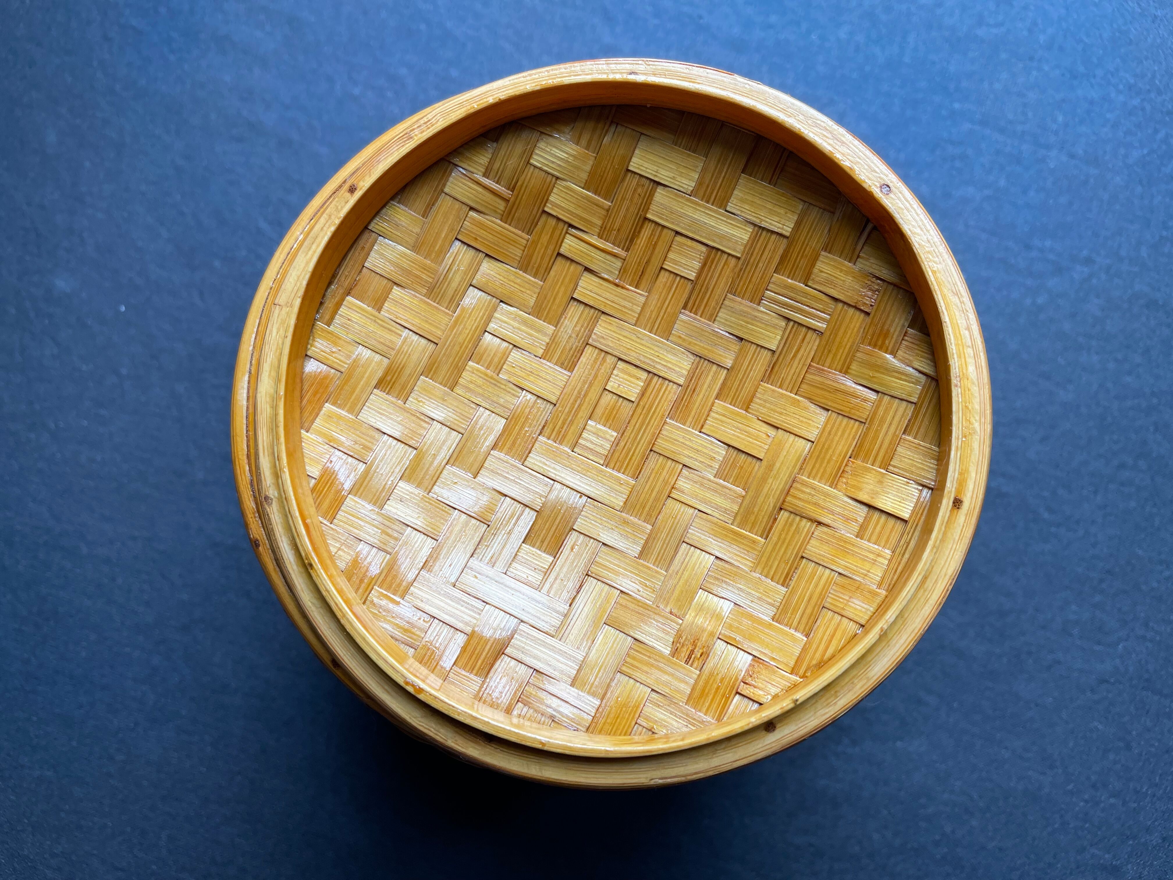Pot with braided bamboo lid