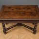 table bureau de style Renaissance / Henri II en chêne massif richement scul